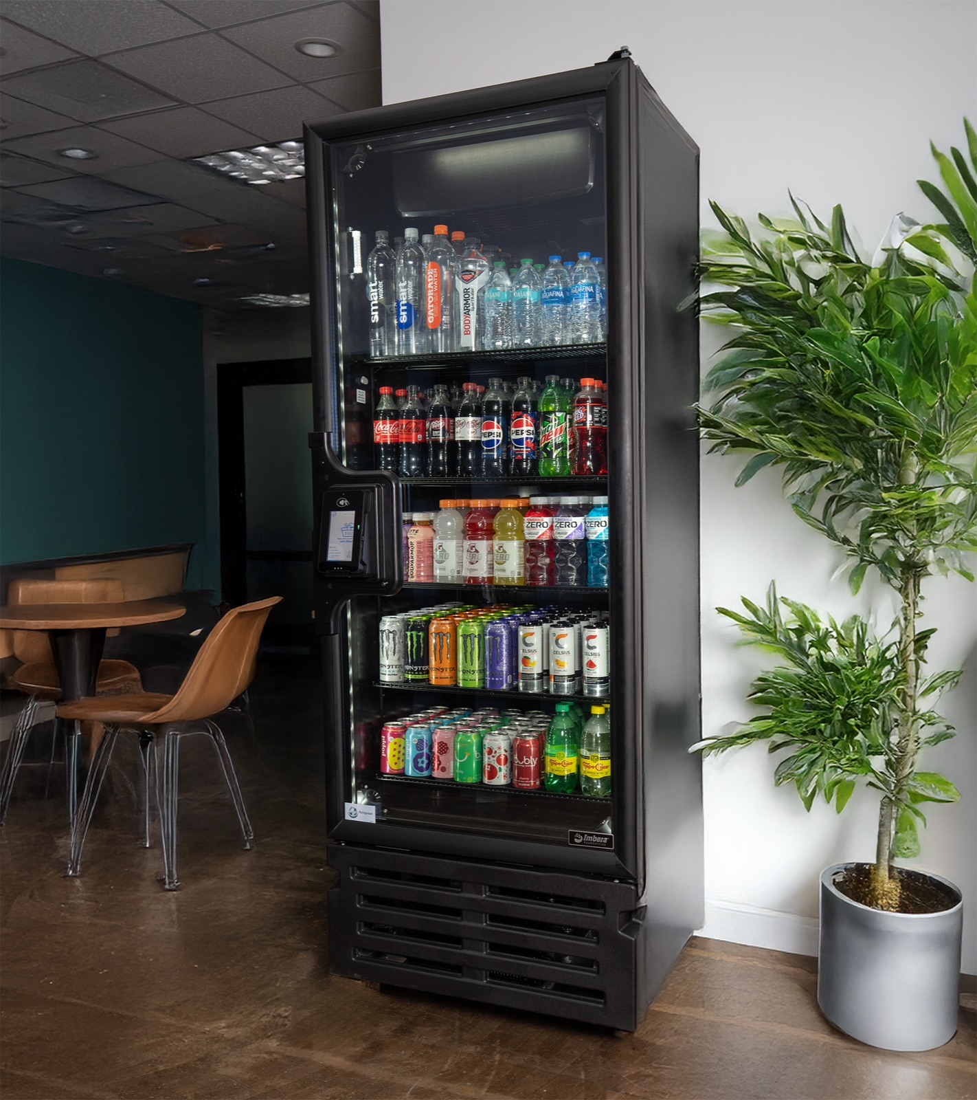 Glass-front beverage cooler in a break room